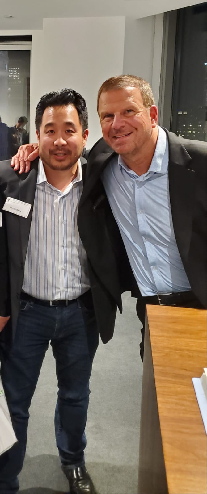 Tejune Kang with Tilman Fertitta at the Harvard Club in New York