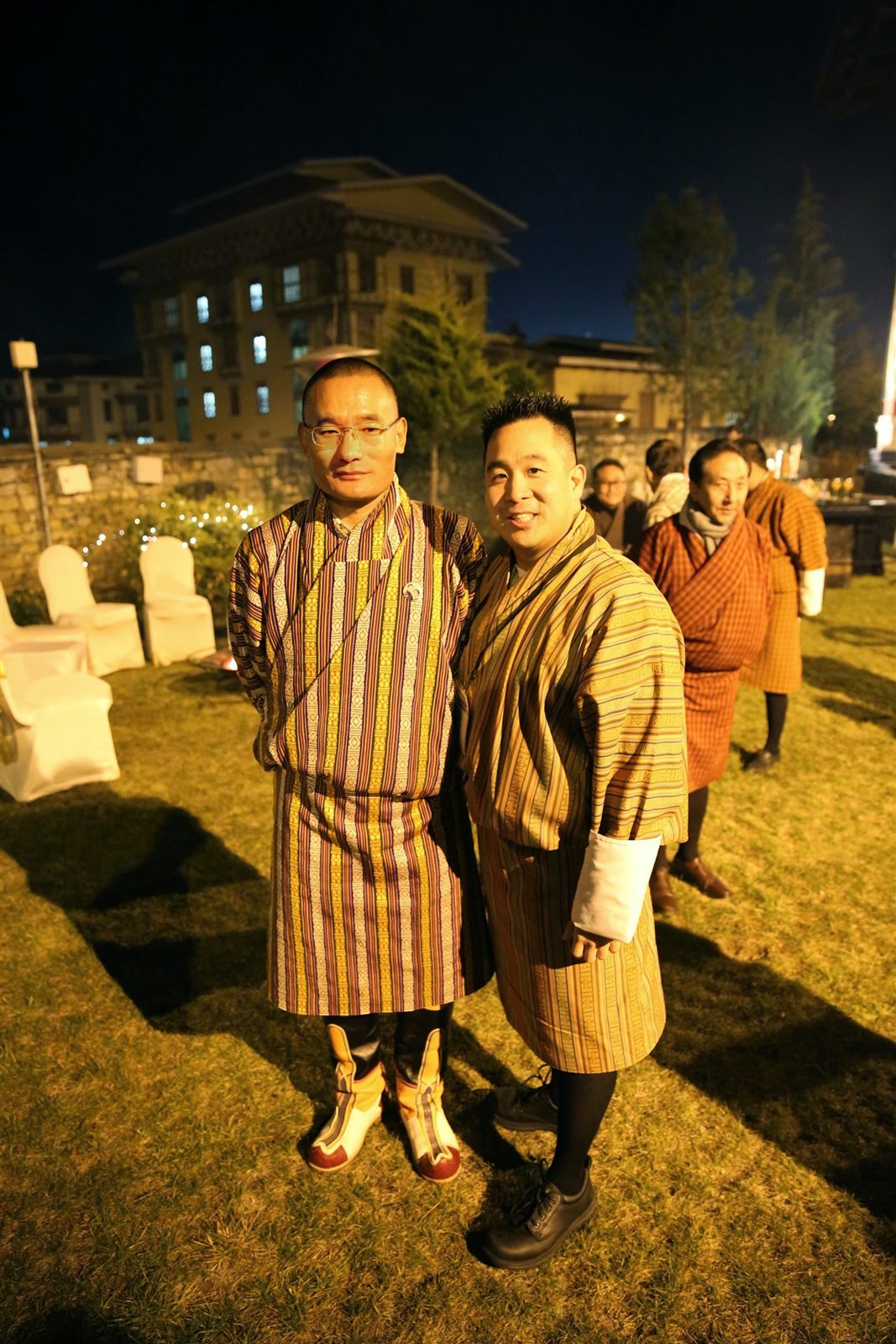 Tejune Kang in Bhutan with Prime Minister Tshering Tobgay, traditional gho