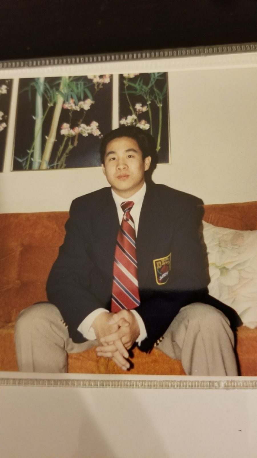 Tejune Kang in his DECA blazer in high school
