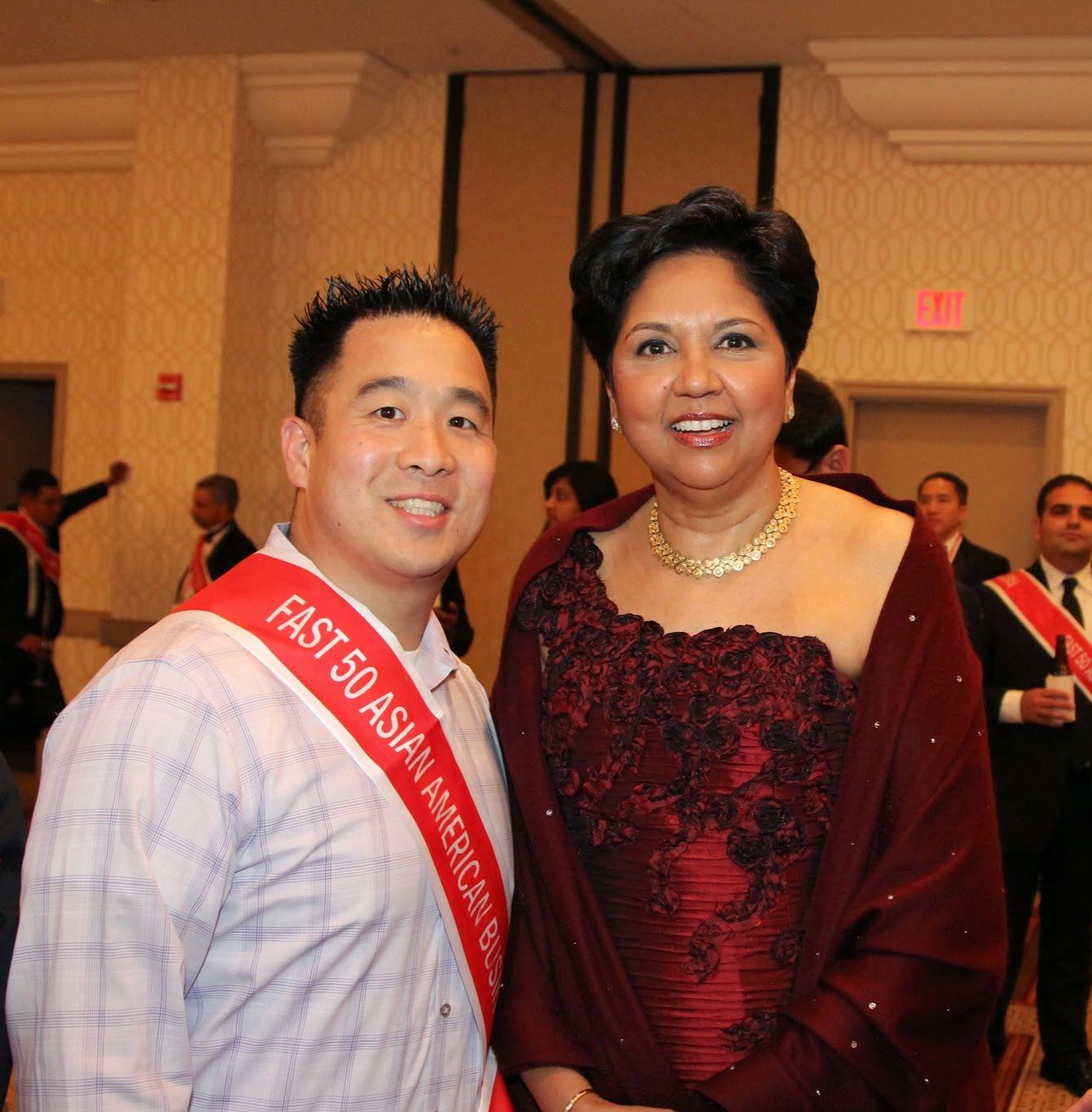 Tejune Kang with Indra Nooyi, former CEO of PepsiCo, at the Fast 50 Asian American Business Leaders gala
